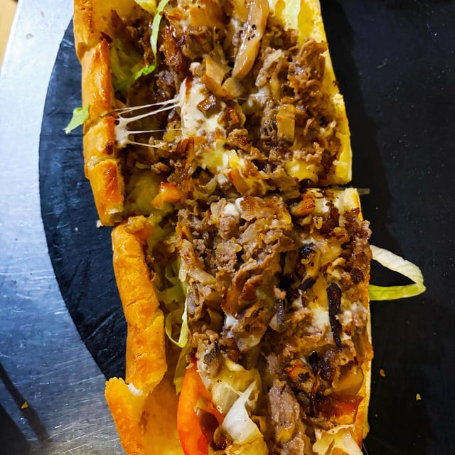 Large Philly Deluxe W Fries.